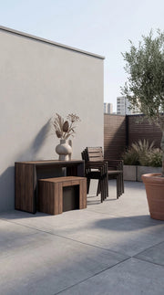 Transformer Table outdoor dining set with expandable table and matching chairs in a modern patio setting