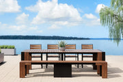 Transformer Table outdoor dining set with expandable table and matching chairs on a patio