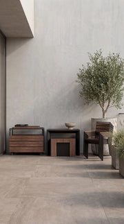 Transformer Table outdoor dining set with extendable table and matching chairs in an outdoor setting