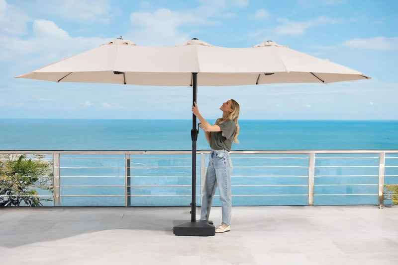 Transformer Table outdoor patio umbrella with canopy providing shade over an outdoor dining area