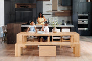 Transformer Table dining set with expandable dining table and matching benches, shown in a modern wood finish