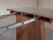 Transformer Table round dining table shown in a modern interior setup