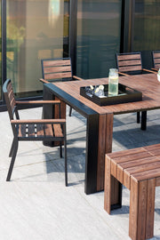 Transformer Table outdoor dining table by Transformer Table, expandable design shown outdoors