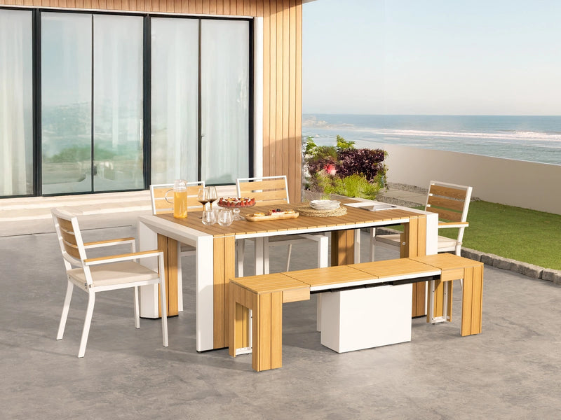 Transformer Table outdoor dining set with expandable table and matching benches in a modern patio setting