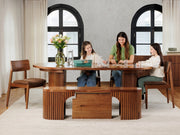 Transformer Table round dining set with expandable table and matching chairs in a modern dining room