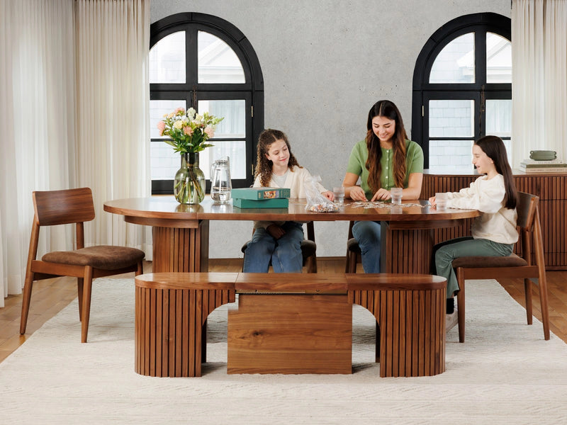 Transformer Table round dining set with expandable table and matching chairs in a modern dining room