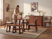 Transformer Table Nova dining set with expandable table and matching chairs, shown in a modern dining room