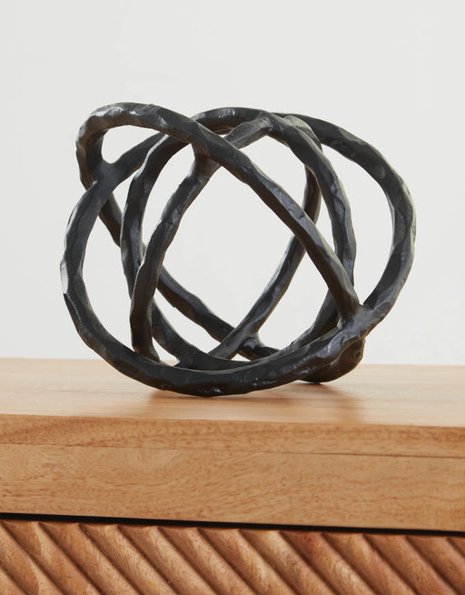 Ashley Furniture Barlee Sculpture set of 2, decorative modern sculptures with abstract design, displayed on a surface in a contemporary setting.