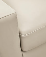 Ashley Furniture Treasure Trove Sofa with detailed stitch upholstery, showcasing plush cushions and elegant design.