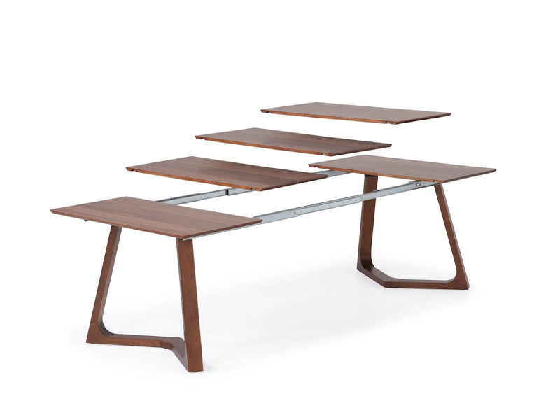 Transformer Table Nova dining table in a modern wood finish, shown expanded for seating.