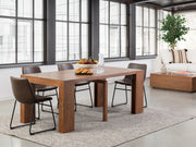 Transformer Table dining table in extended configuration with a modern wood finish