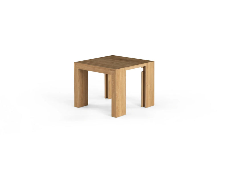 Transformer Table expandable dining table in a modern wood finish, shown fully extended for entertaining