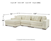 Ashley Furniture Lindyn living room set with sofa and loveseat, featuring neutral upholstery and modern design.