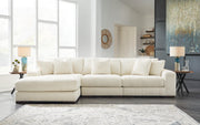 Ashley Furniture Lindyn living room set featuring a sofa, loveseat, and armchair with neutral upholstery and modern design.