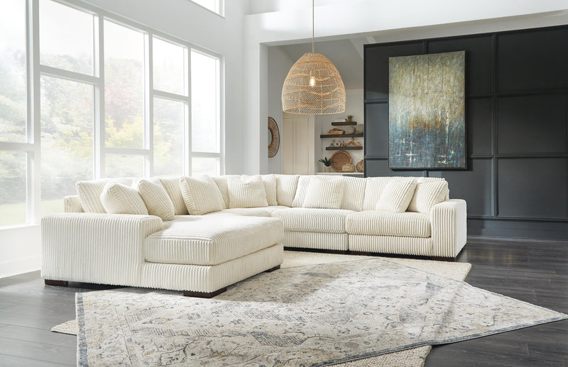 Ashley Furniture Lindyn living room set with a plush sofa and matching armchair in a modern design.
