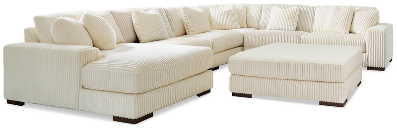 Ashley Furniture Lindyn living room set featuring a sofa and loveseat with plush cushions and contemporary design in neutral tones.