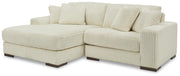 Ashley Furniture Lindyn living room set with sofa, loveseat, and coffee table in a modern design, shown in a well-lit living space.