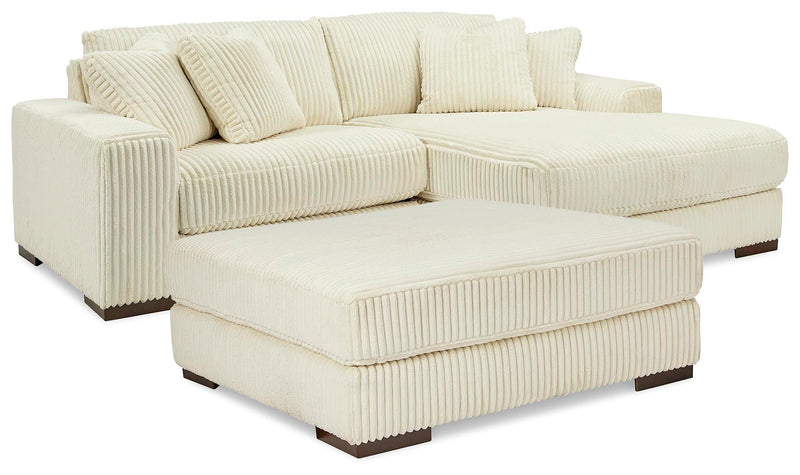 Ashley Furniture Lindyn living room set with plush sofa and coordinating chairs in a modern design, shown in a stylish living space.