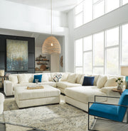 Ashley Furniture Lindyn living room set with sofa, loveseat, and armchair in a modern design with neutral upholstery.