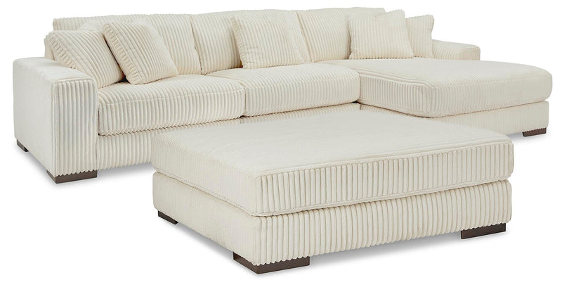 Ashley Furniture Lindyn living room set with sofa and armchair, featuring plush cushions and modern design in a cozy living space.