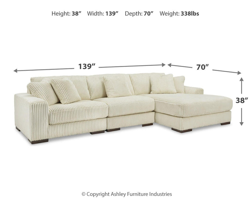 Ashley Furniture Lindyn living room set featuring a sofa and loveseat with neutral upholstery and modern design.