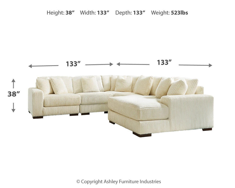 Ashley Furniture Lindyn living room set with plush sofa and matching armchair in a modern, stylish design.