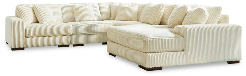 Ashley Furniture Lindyn living room set with sofa and loveseat in stylish fabric, modern design for comfortable home seating.