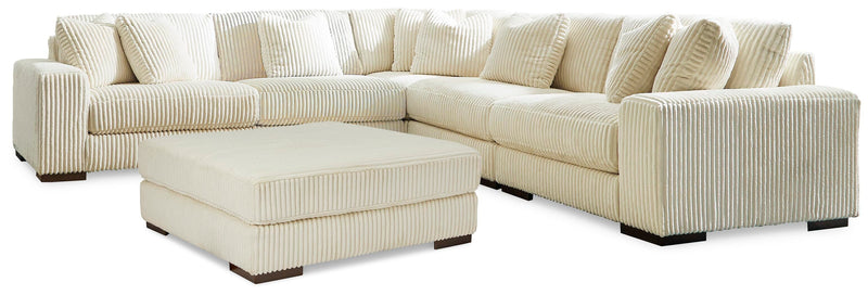 Ashley Furniture Lindyn living room set featuring a sofa and loveseat with plush cushions and modern design.