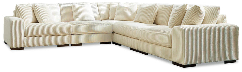Ashley Furniture Lindyn living room set featuring a sofa and loveseat with plush cushions and modern design in a cozy living space.