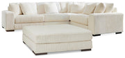 Ashley Furniture Lindyn living room set with sofa, loveseat, and coffee table in a modern living space.