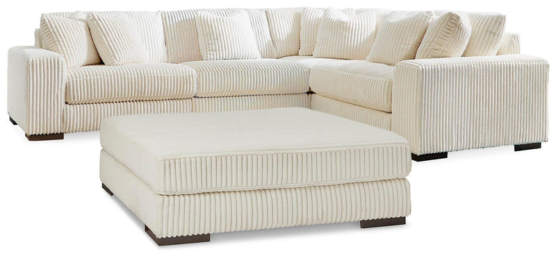Ashley Furniture Lindyn living room set with sofa, loveseat, and coffee table in a modern living space.