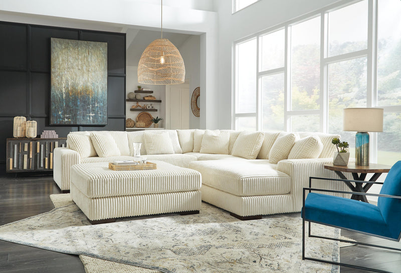 Ashley Furniture Lindyn living room set with sofa, loveseat, and coffee table in a modern design, shown in a stylish living space.