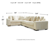 Ashley Furniture Lindyn living room set featuring a sofa and loveseat with plush cushions and neutral fabric upholstery.