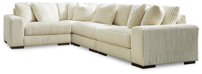 Ashley Furniture Lindyn living room set featuring a sofa, loveseat, and coffee table in a modern design.