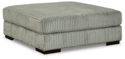 Ashley Furniture Lindyn living room set with sofa and loveseat, featuring plush cushions and modern design, angled view.