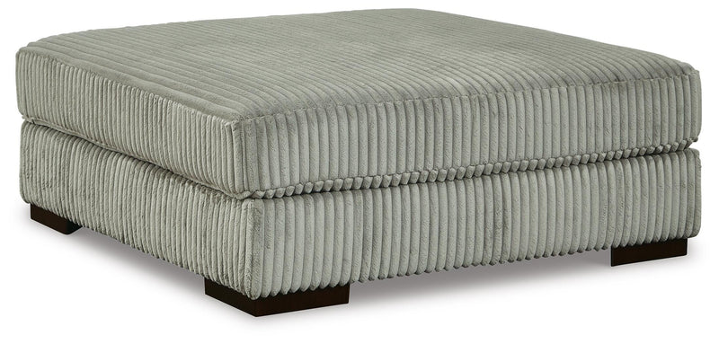 Ashley Furniture Lindyn living room set with sofa and loveseat, featuring plush cushions and modern design, angled view.