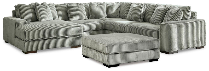 Ashley Furniture Lindyn living room set featuring a sofa and loveseat with plush cushions and modern design.