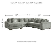 Ashley Furniture Lindyn living room set featuring a plush sofa and loveseat with neutral fabric and modern design.