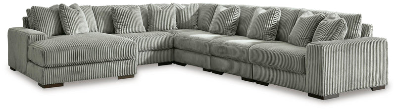 Ashley Furniture Lindyn living room set with a sofa and matching armchair in a modern design with neutral upholstery.