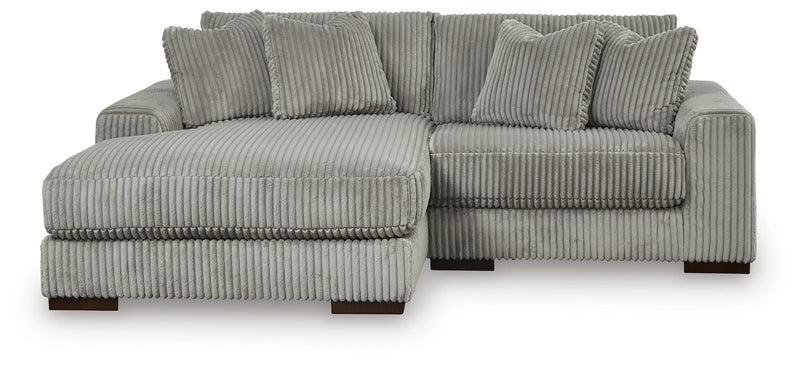 Ashley Furniture Lindyn living room set featuring a sofa and loveseat with plush upholstery and modern design in a cozy living space.