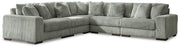 Ashley Furniture Lindyn living room set with sofa, loveseat, and armchair in neutral fabric, arranged in a modern living space.