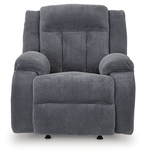 Ashley Furniture Observation Power Recliner showing plush gray upholstery and padded armrests, designed for comfort and support.