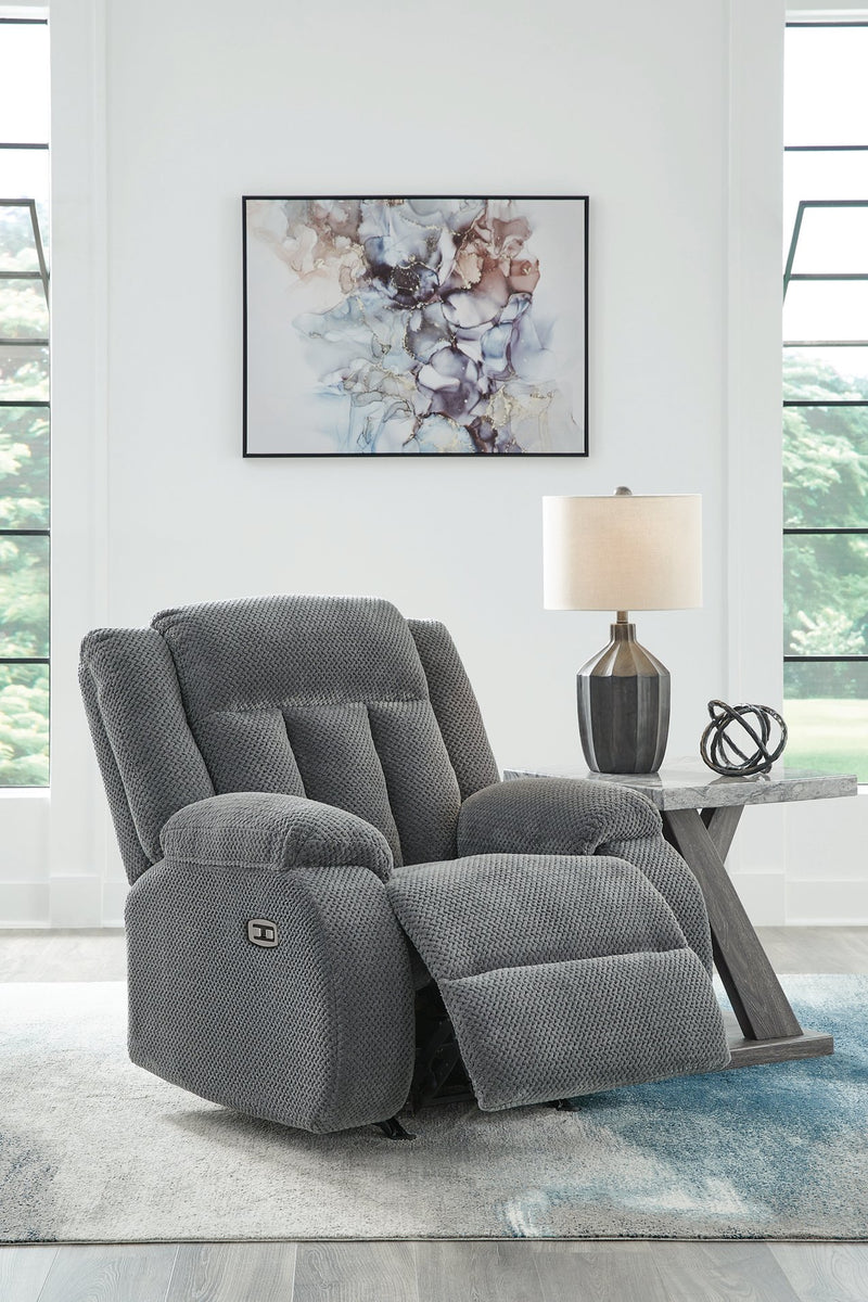 Open Ashley Furniture Observation Power Recliner showing its plush fabric upholstery and adjustable reclining mechanism.