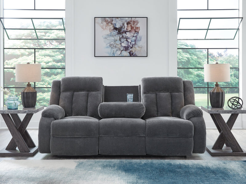 Ashley Furniture observation power reclining sofa with drop-down table, showing plush cushions and built-in center console.
