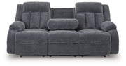 Ashley Furniture observation power reclining sofa with drop-down table, featuring plush upholstery and built-in cup holders.