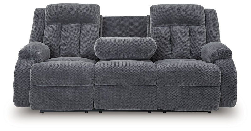 Ashley Furniture observation power reclining sofa with drop-down table, featuring plush upholstery and built-in cup holders.