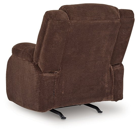 Ashley Furniture observation power recliner with plush fabric and adjustable backrest, shown in a comfortable reclined position.