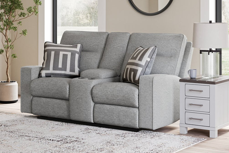 Ashley Furniture Biscoe living room set with beige performance fabric sofa and loveseat in a modern living space.