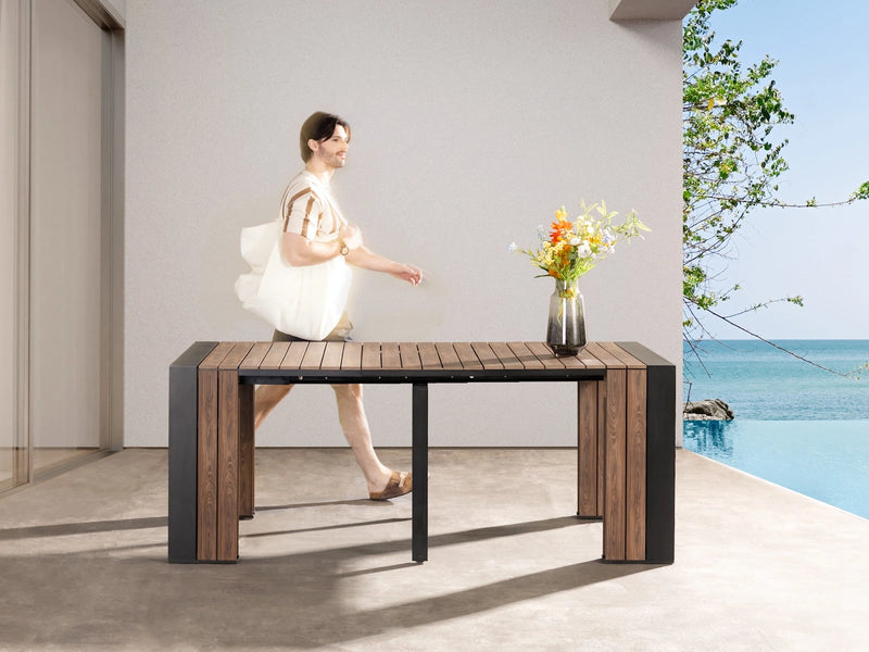 Transformer Table outdoor dining table by Transformer Table, shown in a modern patio setting
