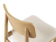 Transformer Table round dining chair in a modern design, shown from the front and side